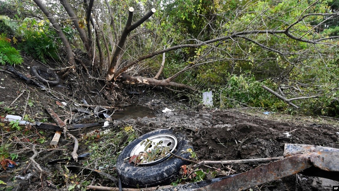 Debris is scattered at the site of Saturday's fatal crash near Schoharie, N.Y., Oct. 7, 2018. Photo taken Oct. 7, 2018. 