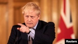 Britain's Prime Minister Boris Johnson speaks during a news conference on the ongoing situation with the coronavirus disease (COVID-19) in London, Britain March 16, 2020.