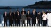 FRANCE -- World leaders pose for a a photograph during the G7 summit in Biarritz on August 25, 2019.
