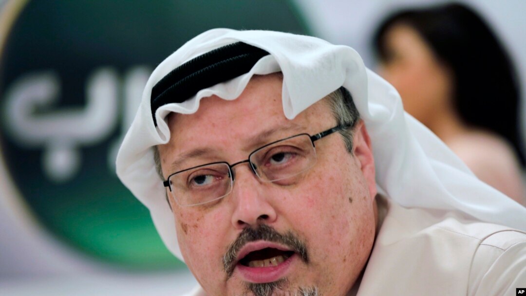 FILE - Saudi journalist Jamal Khashoggi speaks during a press conference in Manama, Bahrain, Feb. 1, 2015. 