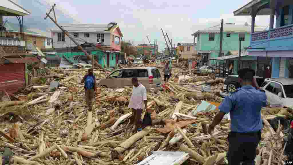 View of damage caused the day before by Hurricane Maria in Roseau, Dominica, Sept. 20, 2017. Hurricane Maria smashed into the eastern Caribbean island of Dominica with its prime minister describing devastating damage as winds and rain from the storm also hit territories still reeling from Irma.