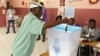 A voter casts his vote in elections in Luanda, Angola, Aug. 23, 2017. 