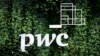 FILE - The logo of accounting firm PricewaterhouseCoopers (PwC) is seen on a board at the St. Petersburg International Economic Forum, Russia, June 6, 2019.