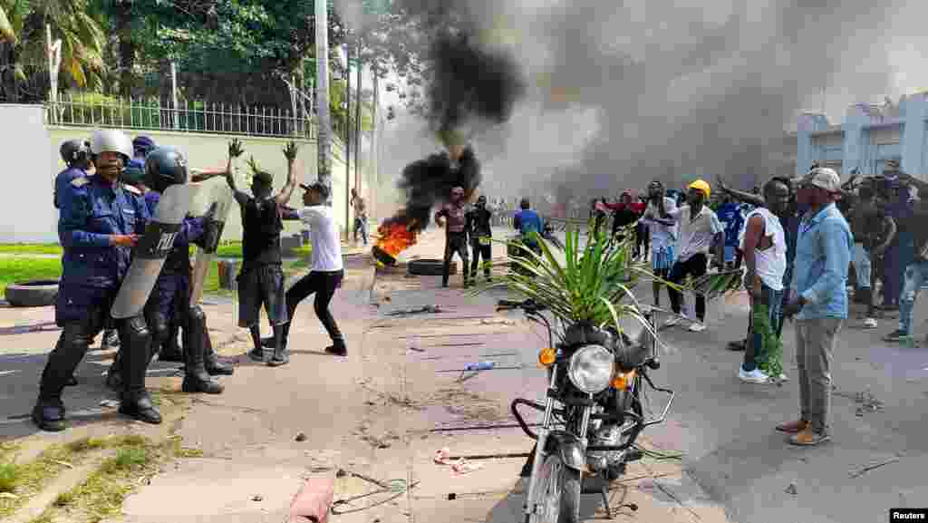 Protesters clash with riot police forces in front of the French Embassy in Kinshasa, Democratic Republic of Congo, Jan. 28, 2025.