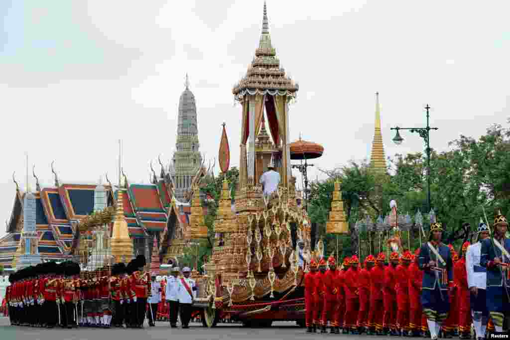 The Great Victory Chariot is pulled during the funeral procession for Thailand's late King Bhumibol Adulyadej before the Royal Cremation Ceremony in front of the Grand Palace in Bangkok.